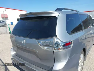 2011 Toyota Sienna SE with VIN 5TDXK3DC8BS131434, listed as a IAAI auction lot 42002675 with 209,396 mi miles. Bid and sale history available at carsss.com. Image 17.