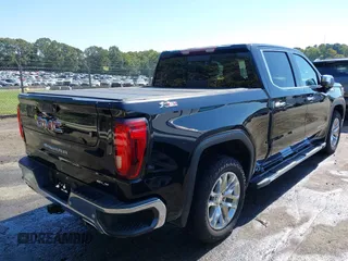 2021 GMC Sierra 1500 SLT z VIN 1GTU9DED7MZ174191, wystawiony jako IAAI lot #40378166 z przebiegiem 94 834 mil mil oraz . Historia ofert i sprzedaży dostępna na DreamBid. Obrazek 4.