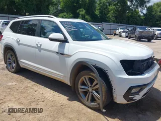 2018 Volkswagen Atlas SEL with VIN 1V2SR2CAXJC548598, listed as a IAAI auction lot 42570908 with 124,193 mi miles and . Bid and sale history available at DreamBid. Image 1.