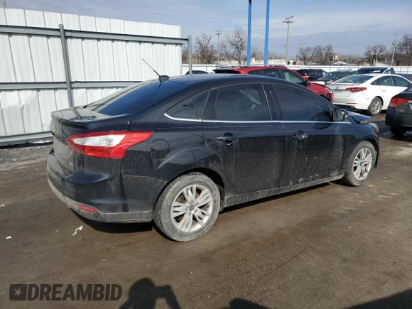 2012 Ford Focus SEL with VIN 1FAHP3H20CL329098, listed as a Copart auction lot 46990485 with 131,783 mi miles and Salvage Title. Bid and sale history available at DreamBid. Image 3.