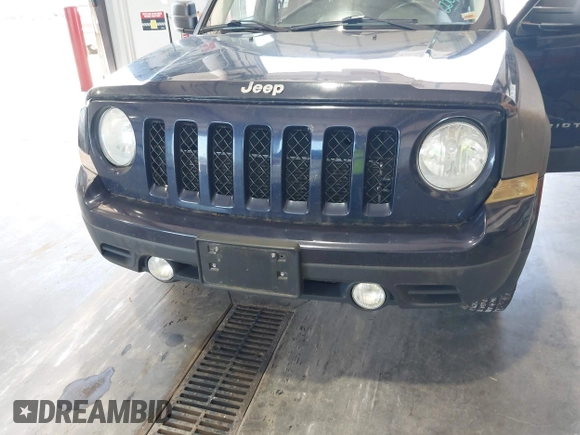 2014 Jeep Patriot Latitude with VIN 1C4NJRFB3ED863519, listed as a IAAI auction lot 42670843 with 220,920 mi miles and . Bid and sale history available at DreamBid. Image 6.