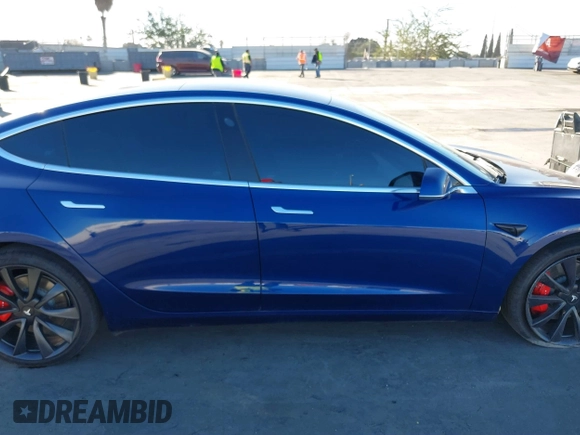 2020 Tesla Model 3 Performance z VIN 5YJ3E1ECXLF641945, wystawiony jako IAAI lot #41337826 z przebiegiem 53 336 mil mil oraz . Historia ofert i sprzedaży dostępna na DreamBid. Obrazek 13.