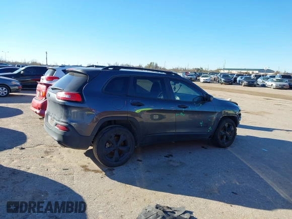 2016 Jeep Cherokee Sport with VIN 1C4PJLAS4GW329773, listed as a IAAI auction lot 41300023 with 101,912 mi miles and . Bid and sale history available at DreamBid. Image 14.