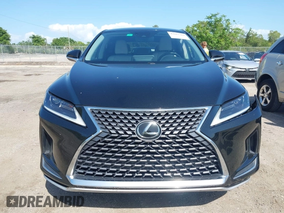 2021 Lexus RX with VIN 2T2AZMAA2MC196524, listed as a IAAI auction lot 42017362 with 80,922 mi miles. Bid and sale history available at carsss.com. Image 12.