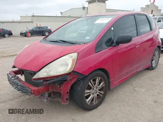 2009 Honda Fit Sport z VIN JHMGE88609S016304, wystawiony jako IAAI lot #42385175 z przebiegiem 254 317 mil mil oraz . Historia ofert i sprzedaży dostępna na DreamBid. Obrazek 6.