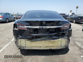 2019 Tesla Model S 75D z VIN 5YJSA1E29KF348065, wystawiony jako Copart lot #60290925 z przebiegiem 73 573 mil mil oraz Szkoda całkowita • Salvage title. Historia ofert i sprzedaży dostępna na DreamBid. Obrazek 6.