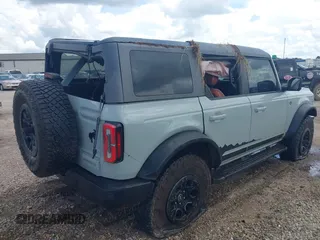 2021 Ford Bronco with VIN 1FMEE5DP6MLA61655, listed as a IAAI auction lot 42492762 with 88,313 mi miles and . Bid and sale history available at DreamBid. Image 4.