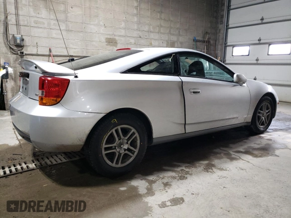 2000 Toyota Celica GT with VIN JTDDR32TXY0021398, listed as a Copart auction lot 82529474 with 271,041 mi miles and Salvage Title. Bid and sale history available at carsss.com. Image 3.