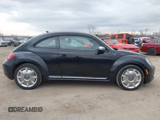 2013 Volkswagen Beetle 2.5L with VIN 3VWJP7AT8DM679548, listed as a IAAI auction lot 41459613 with 135,198 mi miles and . Bid and sale history available at DreamBid. Image 13.