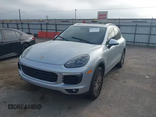 2016 Porsche Cayenne S E-Hybrid with VIN WP1AE2A26GLA59496, listed as a IAAI auction lot 41884022 with 85,386 mi miles and . Bid and sale history available at DreamBid. Image 17.