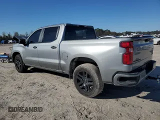 2024 Chevrolet Silverado 1500 Custom with VIN 1GCPABEK2RZ102085, listed as a Copart auction lot 87700835 with 31,311 mi miles and Salvage Title. Bid and sale history available at DreamBid. Image 2.