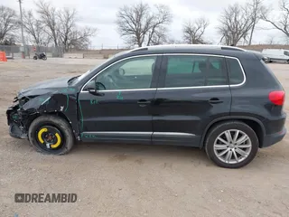 2016 Volkswagen Tiguan S with VIN WVGBV7AX9GW566451, listed as a IAAI auction lot 41393999 with 51,616 mi miles and . Bid and sale history available at DreamBid. Image 15.