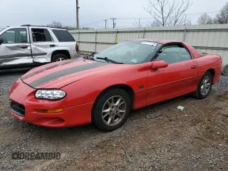 2002 Chevrolet Camaro z VIN 2G1FP22K522104719, wystawiony jako Copart lot #52771115 z przebiegiem 148 993 mil mil oraz Czysty tytuł • Clean title. Historia ofert i sprzedaży dostępna na DreamBid. Obrazek 1.