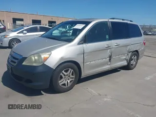 2006 Honda Odyssey EX-L with VIN 5FNRL38766B038599, listed as a IAAI auction lot 41989217 with 164,118 mi miles. Bid and sale history available at carsss.com. Image 19.