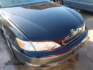 1997 Lexus ES 300 Luxury Sport Sdn with VIN JT8BF22GXV5003056, listed as a IAAI auction lot 41806886 with 130,063 mi miles. Bid and sale history available at carsss.com. Image 18.