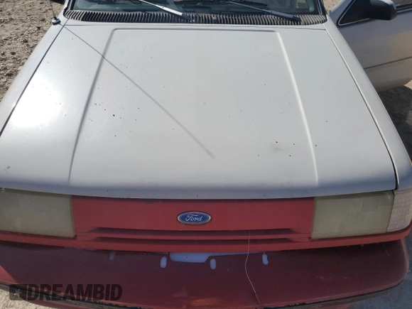 1992 Ford Tempo GL z VIN 2FAPP36XXNB207779, wystawiony jako Copart lot #49348685 z przebiegiem 526 491 mil mil oraz Czysty tytuł • Clean title. Historia ofert i sprzedaży dostępna na DreamBid. Obrazek 11.