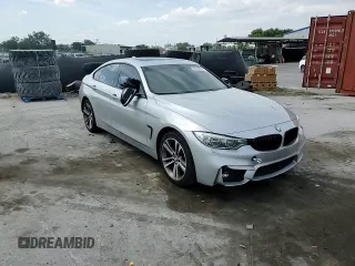 2015 BMW 4 Series 428i xDrive with VIN WBA4C9C55FD331210, listed as a Copart auction lot 54158235 with 88,372 mi miles and Salvage title. Bid and sale history available at DreamBid. Image 13.