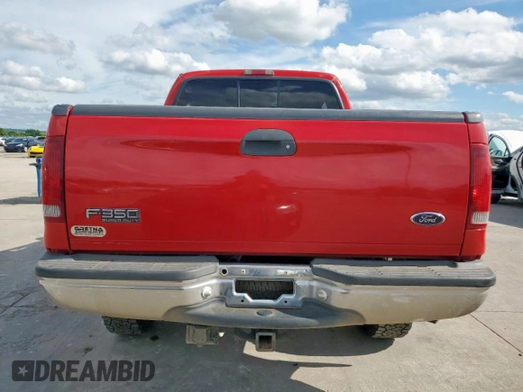 2000 Ford F-350 XL z VIN 1FTSX31F5YEA17061, wystawiony jako Copart lot #61017305 z przebiegiem 162 814 mil mil oraz Czysty tytuł • Clean title. Historia ofert i sprzedaży dostępna na DreamBid. Obrazek 6.