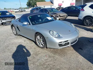 2007 Porsche Boxster with VIN WP0CA29897U712136, listed as a IAAI auction lot 42528193 with 77,087 mi miles and . Bid and sale history available at DreamBid. Image 1.