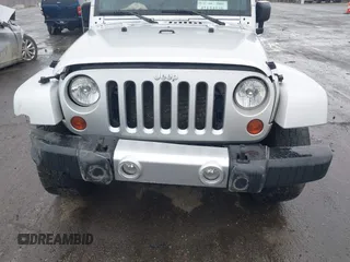 2010 Jeep Wrangler Sahara с VIN 1J4AA5D10AL166398, выставлен на аукционе IAAI как лот 42144530 с пробегом 140 020 миль миль и . История ставок и продаж доступна на DreamBid. Изображение 6.