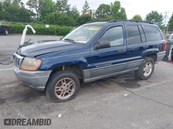 2002 Jeep Grand Cherokee Laredo with VIN 1J4GX48S02C125258, listed as a IAAI auction lot 42388724 with 295,270 mi miles and . Bid and sale history available at DreamBid. Image 17.