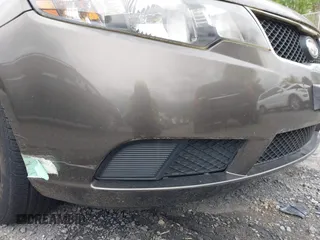 2010 Kia Forte EX with VIN KNAFU4A23A5847814, listed as a IAAI auction lot 42048432 with 97,678 mi miles. Bid and sale history available at carsss.com. Image 13.
