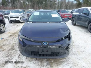 2022 Toyota Corolla Hybrid LE with VIN JTDEAMDEXNJ048722, listed as a IAAI auction lot 41383037 with 72,878 mi miles. Bid and sale history available at carsss.com. Image 12.