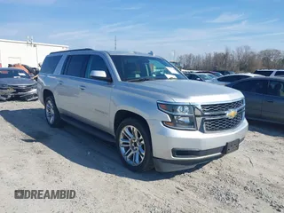 2018 Chevrolet Suburban LT with VIN 1GNSCHKCXJR266409, listed as a IAAI auction lot 41510241 with 114,387 mi miles and . Bid and sale history available at DreamBid. Image 1.