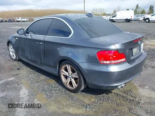 2013 BMW 1 Series 128i with VIN WBAUP7C5XDVP24796, listed as a IAAI auction lot 41807533 with 157,614 mi miles and . Bid and sale history available at carsss.com. Image 3.