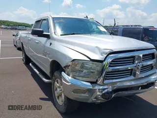2015 Ram 2500 SLT with VIN 3C6UR5JJ3FG672917, listed as a IAAI auction lot 42618364 with 216,787 mi miles and . Bid and sale history available at DreamBid. Image 1.