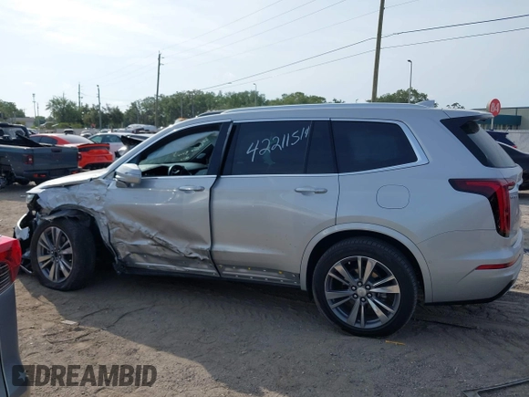 2020 Cadillac XT6 FWD Premium Luxury z VIN 1GYKPCRSXLZ136057, wystawiony jako IAAI lot #42211514 z przebiegiem 32 476 mil mil oraz . Historia ofert i sprzedaży dostępna na DreamBid. Obrazek 14.
