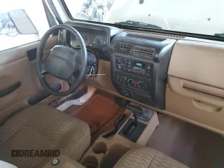 1999 Jeep Wrangler Sport с VIN 1J4FY19S9XP414239, выставлен на аукционе Copart как лот 66882505 с пробегом 131 916 миль миль и Чистый • Clean title. История ставок и продаж доступна на DreamBid. Изображение 8.