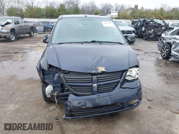 2007 Dodge Grand Caravan SE with VIN 1D4GP24R27B172322, listed as a IAAI auction lot 42005459 with 128,434 mi miles and . Bid and sale history available at DreamBid. Image 13.