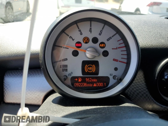 2010 MINI Hardtop S with VIN WMWMF7C57ATX43204, listed as a Copart auction lot 64771285 with 92,236 mi miles and Clean title. Bid and sale history available at DreamBid. Image 9.