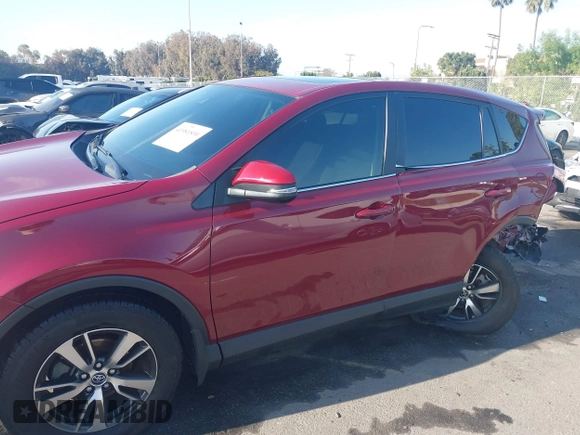 2018 Toyota RAV4 XLE with VIN JTMWFREV8JD119720, listed as a IAAI auction lot 41981890 with 43,048 mi miles. Bid and sale history available at carsss.com. Image 13.