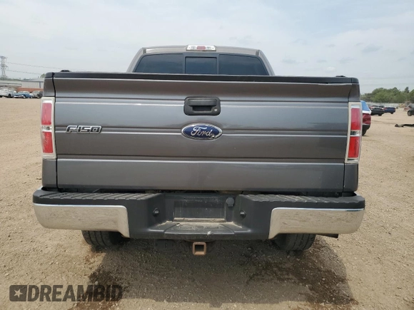 2013 Ford F-150 XL with VIN 1FTFW1ET1DKF57964, listed as a Copart auction lot 58801885 with 176,584 mi miles and Salvage title. Bid and sale history available at DreamBid. Image 6.