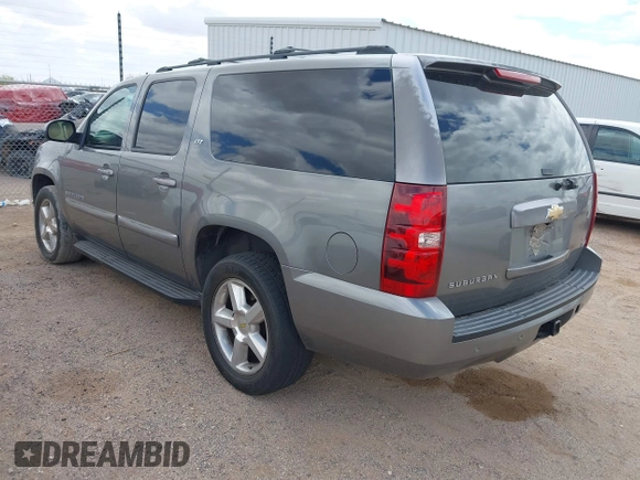 2007 Chevrolet Suburban LT with VIN 1GNFK16327J242103, listed as a IAAI auction lot 42172990 with 185,103 mi miles and . Bid and sale history available at DreamBid. Image 3.