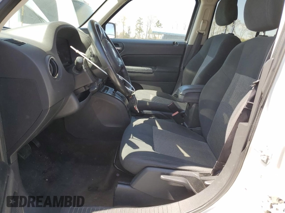 2016 Jeep Patriot Latitude with VIN 1C4NJRFB9GD637469, listed as a Copart auction lot 50377715 with 103,038 mi miles and Salvage title. Bid and sale history available at DreamBid. Image 7.