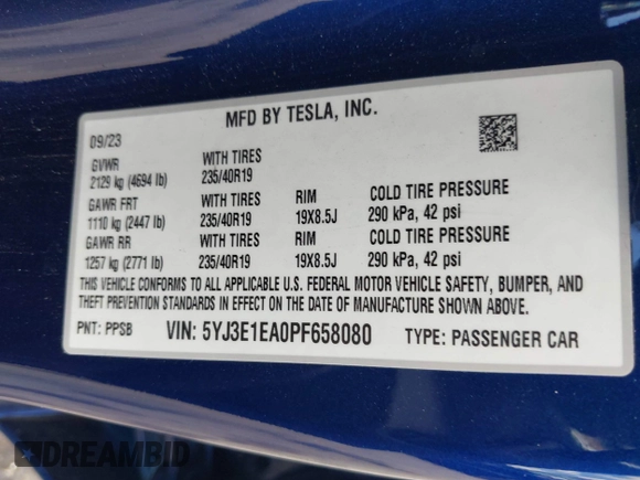 2023 Tesla Model 3 with VIN 5YJ3E1EA0PF658080, listed as a IAAI auction lot 42008846 with 32,301 mi miles and . Bid and sale history available at carsss.com. Image 9.
