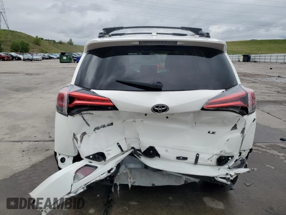 2017 Toyota RAV4 LE z VIN JTMZFREV4HJ721331, wystawiony jako Copart lot #58829225 z przebiegiem 24 880 mil mil oraz Szkoda całkowita • Salvage title. Historia ofert i sprzedaży dostępna na DreamBid. Obrazek 6.