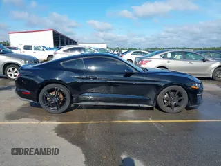 2019 Ford Mustang EcoBoost with VIN 1FA6P8THXK5124729, listed as a IAAI auction lot 42384176 with 134,028 mi miles and . Bid and sale history available at DreamBid. Image 13.