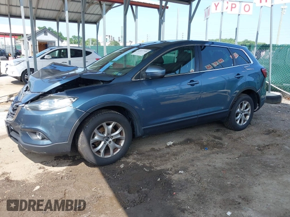 2014 Mazda CX-9 Touring with VIN JM3TB3CV7E0440747, listed as a IAAI auction lot 42457709 with 166,588 mi miles and . Bid and sale history available at DreamBid. Image 20.