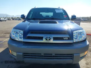 2003 Toyota 4Runner SR5 with VIN JTEZT14R238001097, listed as a IAAI auction lot 41266011 with 180,905 mi miles. Bid and sale history available at carsss.com. Image 6.