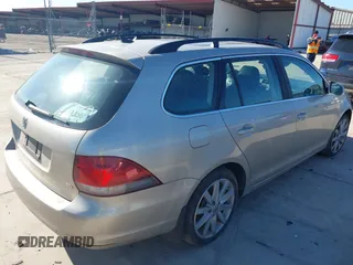 2012 Volkswagen Jetta SportWagen TDI with VIN 3VWPL7AJ8CM696238, listed as a IAAI auction lot 41369436 with 200,070 mi miles. Bid and sale history available at carsss.com. Image 4.