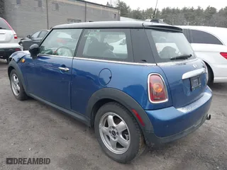 2009 MINI Cooper Hardtop with VIN WMWMF33579TW72543, listed as a IAAI auction lot 41844387 with 125,835 mi miles. Bid and sale history available at carsss.com. Image 3.