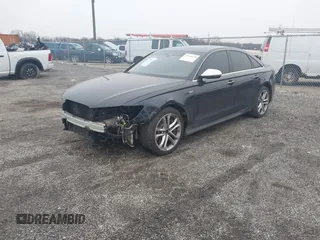 2016 Audi S6 Prestige with VIN WAUH2AFC4GN177293, listed as a IAAI auction lot 41549559 with 79,715 mi miles. Bid and sale history available at carsss.com. Image 2.