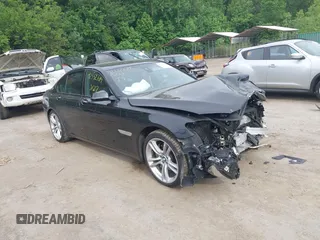 2015 BMW 7 Series 740i z VIN WBAYA6C54FGK16411, wystawiony jako IAAI lot #42332689 z przebiegiem 59 153 mil mil oraz . Historia ofert i sprzedaży dostępna na DreamBid. Obrazek 1.