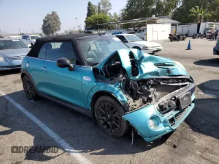 2018 MINI Convertible Cooper S with VIN WMWWG9C5XJ3C82701, listed as a Copart auction lot 76080984 with 50,655 mi miles and Salvage Title. Bid and sale history available at carsss.com. Image 4.
