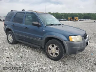 2001 Ford Escape XLT with VIN 1FMYU03111KA96413, listed as a Copart auction lot 53667935 with 156,668 mi miles and Clean Title. Bid and sale history available at carsss.com. Image 4.