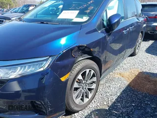 2022 Honda Odyssey EX-L with VIN 5FNRL6H7XNB061061, listed as a IAAI auction lot 41257019 with 52,194 mi miles and . Bid and sale history available at DreamBid. Image 6.